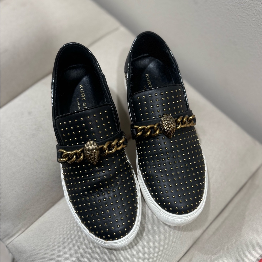 Kurt Geiger Black Leather Studded Slip-On Sneakers with Gold Chain
